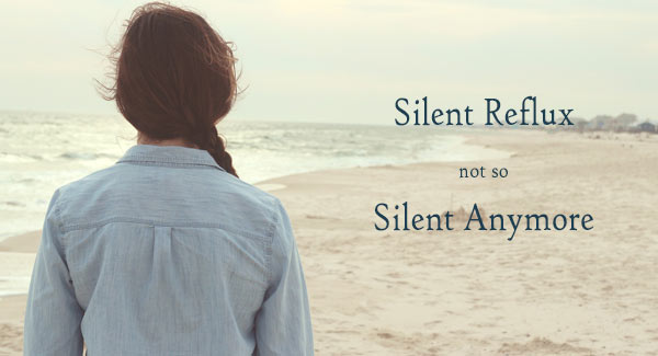Woman with Back to You Standing on Silent Beach.